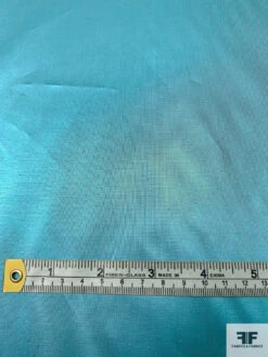 Italian Tissue Lamé - Electric Turquoise 12 Italian Tissue Lamé - Electric Turquoise -Fabrics And Fabrics Store 17771 6