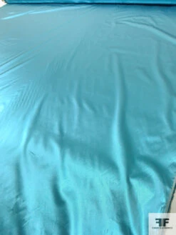 Italian Tissue Lamé - Electric Turquoise 14 Italian Tissue Lamé - Electric Turquoise -Fabrics And Fabrics Store 17771 8