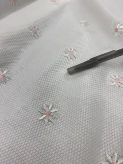 Floral Embroidered Cotton Pique - White/Pink 17 Floral Embroidered Cotton Pique - White/Pink -Fabrics And Fabrics Store WhatsAppImage2023 04 28at11.51.54AM